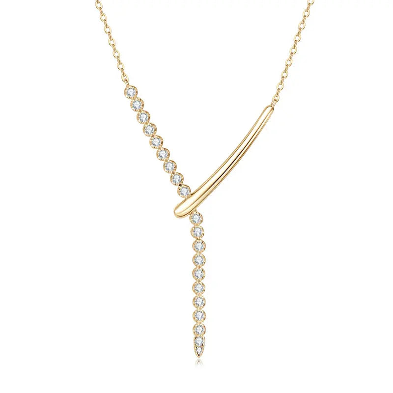 Gold necklace with a Y-shaped pendant on a white background