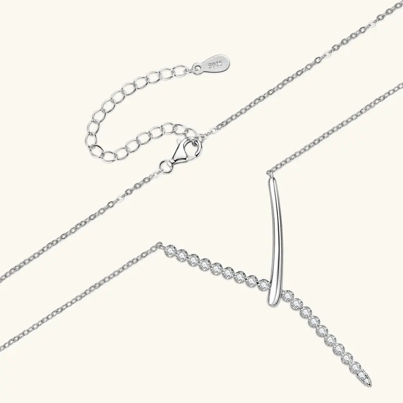 Silver necklace with a pendant on a white background